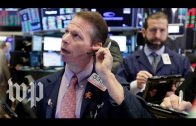 Nasdaq closes at record while Dow, S&P down